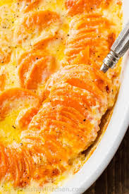 The Creamiest Scalloped Potatoes Recipe Sweet Potatoes Slices In A Rich And Creamy Garlic Bu Scalloped Sweet Potatoes Sweet Potato Slices Sweet Potato Recipes