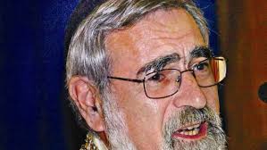 Rabbi lets consumerism have it between the i's