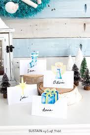 Get my free holiday place card designs (design #165) from my free resource library (get the password to the library in the form at the bottom of this post). Free Printable Christmas Place Cards Sustain My Craft Habit