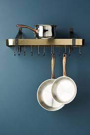 After pricing hanging pot racks i decided that i would just make one of my own. Gala Wall Mounted Pot Rack 150 Anthropologie Organization Items That Bring Style To Your Spring Cleaning Popsugar Home Photo 38