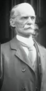 On the West cliff, near the whale bones there is a public bench. On the  bench there is a plaque. On the plaque there is engraved the name Lupton  which is the