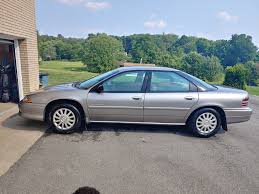 Image result for Sand Chargold 1995 Sebring