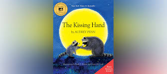 It features a mother raccoon comforting a child raccoon by kissing its paw. The Kissing Hand Audrey Penn