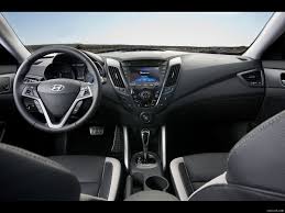 Dimensions, seating comfort, and features. 2013 Hyundai Veloster Turbo Interior Caricos
