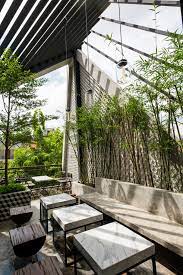 Le House Designs A Secret Garden Cafe In Hanoi Interior Garden Cafe Interior Design Garden Cafe