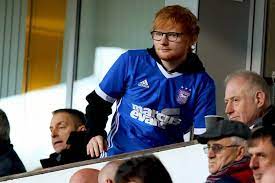 Ed sheeran's got another string to add to his impressive bow as the singer has officially been added to ipswich town fc's squad list for the upcoming 2021/22 season. Ed Sheeran To Be Ipswich Town Shirt Sponsor Hints At New Albums Tour