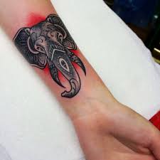 This tattoo is a beautiful piece of dotwork, blackwork, and shading. Forearm Tattoo Ideas Elephant Novocom Top