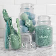 You will need a cricut maker or cricut joy with a fine point blade for this mason jar bathroom storage diy. Custom Engraved Apothecary Glass Bathroom Jars