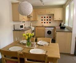 For your little family, the use of furniture such as stool table and chairs is the best choice. The Most Captivating Simple Kitchen Design For Middle Class Family Archlux Net Simple Kitchen Design Small Space Kitchen Small Kitchen Tables