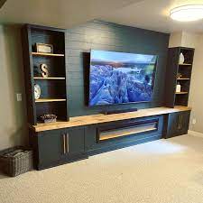 Dad's got a big tv…mom's got a big entertainment center. Entertainment Center Build Woodworking