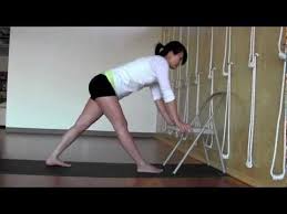 Revolving Triangle Pose Using A Chair