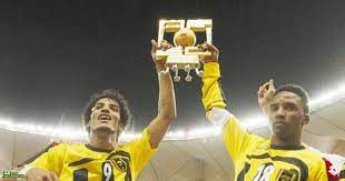 محمد نور و نايف هزازي يحتفلان بتحقيق الاتحاد بطولة كاس الملك ٢٠١٠