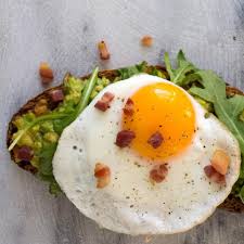 Avocado Toast With Egg Arugula Bacon Recipe Stuffed Avocado Healthy Toast Recipes Healthy Toast Recipes