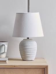Table lamps with traditional brass bases paired with neutral colored shades match almost any rooms theme. Whitewashed Concrete Effect Table Lamp Table Lamps Uk Ceramic Table Lamps Concrete Table Lamp