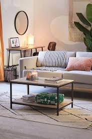 In this pittsburgh tudor revival, two gilded coffee tables are paired with an art deco armchair, a custom sofa, and a set of chairs by edward wormley for dunbar—so guests can enjoy. The Best Coffee Tables For Small Apartments Popsugar Home