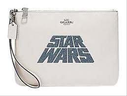 Calling all you fashionistas out there with it's certainly been all things star wars in recent months with the opening of star wars: Coach Large Star Wars X Glitter Pouch White Leather Wristlet Tradesy