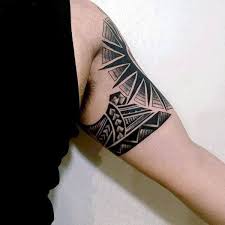 Tribal armband tattoos are considered lucky and believed to keep evil spirits away from a person. 75 Tribal Arm Tattoos For Men Interwoven Line Design Ideas
