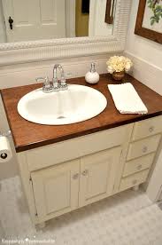 Bathroom vanity ideas:the sink, vanity top, mirror and lighting, linen cabinets, wall cabinets and shelves, even picture credit: Totally Transformed Updating An Old Bathroom Vanity Exquisitely Unremarkable
