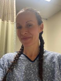 What is the expected pain level during a biopsy procedure?