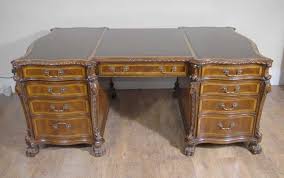 Antiques uk large mahogany partners desk with inset red leather writing surface, each kneehole having nine drawers. Partners Desks A Guide And History