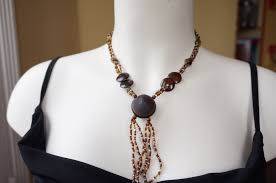 Collier Avec Un œil De Bœuf Graine Porte Bonheur Et De L œil De Tigre Bisuteria Pulseras Bisuteria Y Collares