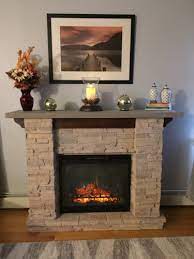 Rustic pine structuralelements provide abeautiful contrast withthe stone. Featherston Electric Fireplace Mantel Package Gds28l8 1152lr Dimplex
