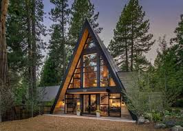 Small and simple with open floor plans and sleeping lofts. Contemporary A Frame Cabin With A Soaring Ceiling Digsdigs