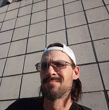 What is the building being constructed near Sawdust Corners in Lapeer?