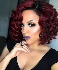 The crimson highlights are woven into the black hair with fiery orange undertones, making this the style for lovers of bold warm hair colors. 45 Beautiful Bob Hairstyles For Black Women Buzz16