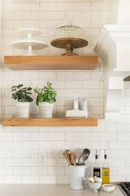 Oak Floating Shelves With Cake Stands Transitional Kitchen Don't forget to use wood filler to hide all the ugly spots and minwax golden oak finish to paint the putting floating shelves in your kitchen can be a great help for anyone. oak floating shelves with cake stands