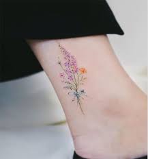 Floral tattoos are always popular when it comes to permanent ink art. 38 Watercolor Tattoo Ideas For Women Mom S Got The Stuff In 2021 Tattoos Wildflower Tattoo Feminine Tattoos
