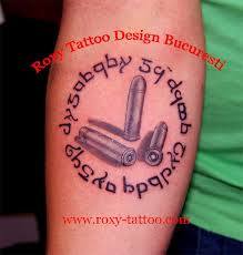 Short nice small pistol gun in belt tattoo. 25 Cool Bullet Tattoo Designs That You Wouldn T Wanna Dodge Body Art Guru