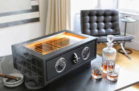 It features solid wood construction, has four beveled tempered glass top sectionals, includes a glass hygrometer. Luxury Safe Maker Dottling Unveils Premium Cigar Humidor Luxurylaunches