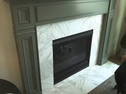 Black And White Tile Fireplace Surround Carrara White Tile Fireplace Surround Found At Contempo Tile Freestanding Fireplace Wooden Fireplace Fireplace Tile