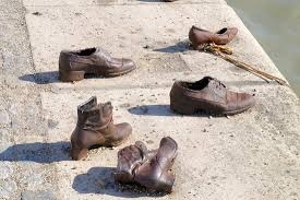 Maybe you would like to learn more about one of these? The Shoes On The Danube Bank Is A Memorial In Budapest Hungary Conceived By Film Director Can Togay He Created It On The East Bank Of The Danube River With Sculptor Gyula