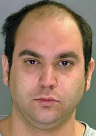 Police: Man used mirror to peer up woman's skirt as she stood at ATM