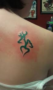 The owl tattoos have many variations in designs, colors etc. Green Tribal Deer Couple Tattoo