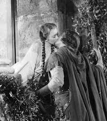 Errol Flyn Kissing Olivia De Haviland In The 1938 Film Robin Hood He Used To Mess Up The Scene Just So He Could Do It Aga Movie Kisses Robin Hood Maid Marian