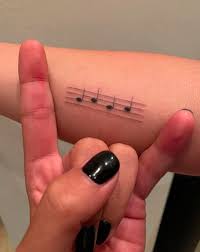 You can either have a single note on your finger, hand, ear or at the back of your neck, or the notes of your favorite song flawlessly inked like an anklet. Is Lady Gaga Music Note Tattoo An Ode To Bradley Cooper