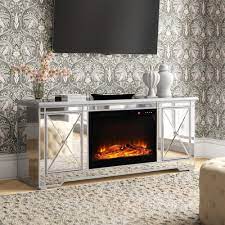 A fireplace doesn't just keep you warm; House Of Hampton Sariah Solid Wood Tv Stand For Tvs Up To 70 With Electric And Fireplace Included Reviews Wayfair