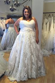 The instantly recognizable silhouette is fitted through the waist and then flows to the floor. A Line Sweetheart Ruched Satin Lace Plus Size Wedding Dress With Crystals Plus Size Wedding Gowns Aline Wedding Dress A Line Wedding Dress
