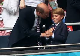 Prince george matched with his dad prince william while watching england and germany compete at wembley stadium. Lmpurlll24ih7m