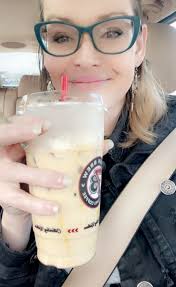 Puppy enjoying pup cup treat