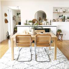 This area rug accents the seating area. The Right Rug Size For Your Dining Room Ruggable Blog