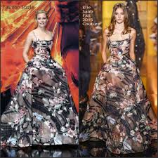 Elizabeth banks' character effie trinket was always the most colourful thing about these films, and the screenwriters cleverly contrived a way to work her into 'mockingjay', even though effie has. Elizabeth Banks In Elie Saab At The Hunger Games Mockingjay Part 2 Berlin Premiere Fashionsizzle