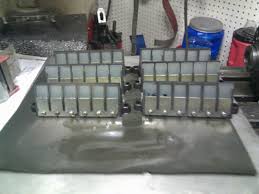 Stock cylinder port admission motor: Chris Carson Marine Manufacturer Of Custom Reed Valves For All Outboard Applications