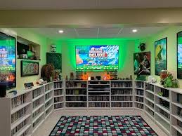 Time To Sit Back Relax And Play Some New Super Mario Bros U Deluxe In The Movie Room Retro Games Room Movie Room Gamer Room Diy