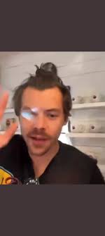 Harry saying hi to a fan