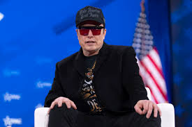 Elon Musk says federal employees must either document their work — or lose their jobs : NPR