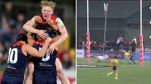 A midfielder, 1.86 metres (6 ft 1 in) tall and weighing 96 kilograms (212 lb). Afl Christian Petracca Goal Decides Melbourne Thrilling Win Over St Kilda Simon Goodwin Slams Arc Review Sytem